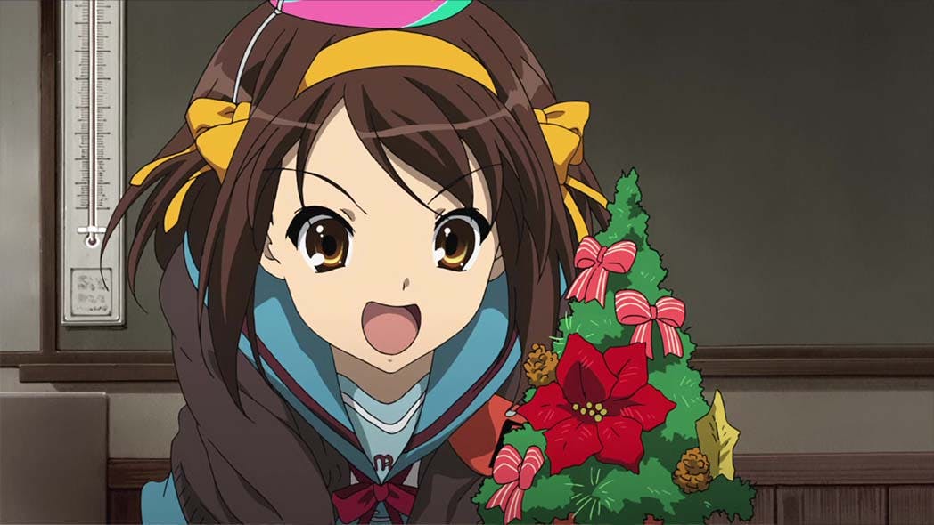 Haruhi Suzumiya radiates joy while gazing at a petite Christmas tree adorned with delicate ribbons and acorns, her festive spirit enhanced by the whimsical addition of a party hat.{caption: Haruhi Suzumiya in The Disappearance of Haruhi Suzumiya (2010)}